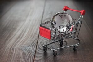 Glass Globe In The Shopping Trolley Concept